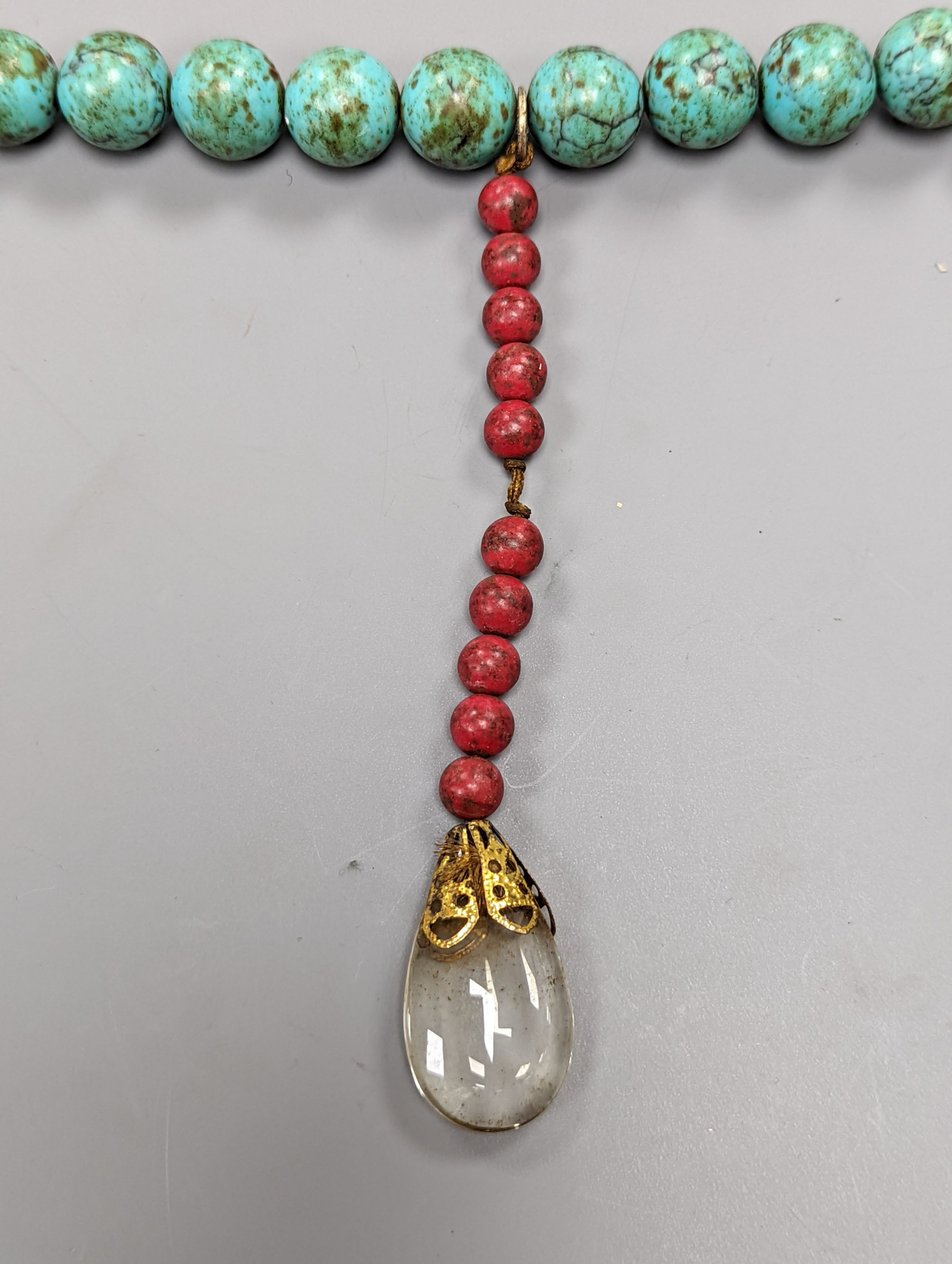 A Chinese turquoise matrix court style necklace in a hardwood box